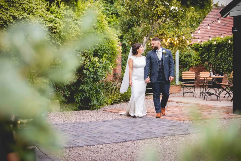 curradine barns couple in courtyard