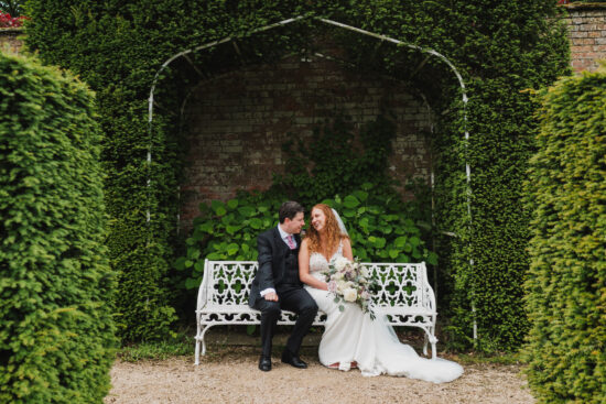 combermere abbey couple sitting gardens