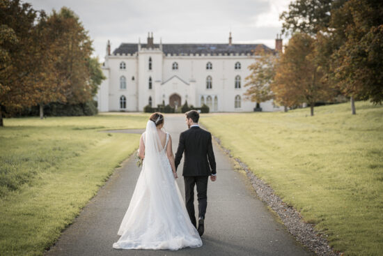 Combermere Abbey couple walking the drive