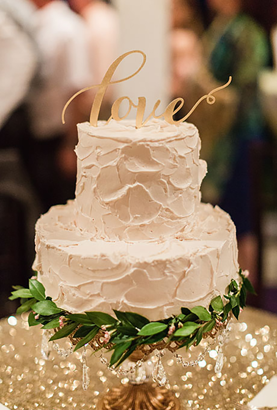 Bling up your barn wedding venue with sparkling metallic wedding cake accessories