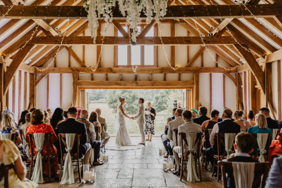 brookfield barn couple lake backdrop
