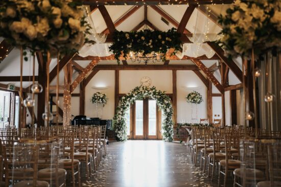 The oak barn at Sandhole Oak Barn wedding venue in Cheshire set up for a wedding ceremony