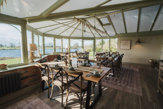 Conservatory breakfast dining at Sandhole Oak Barn Cheshire wedding venue