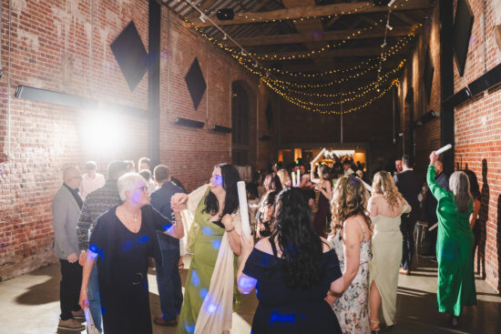 An evening reception with guests dancing at Branches Park